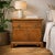 Pair of Thomasville Mid-Century Wood Nightstands. A matched pair of vintage Thomasville bedside cabinets in a warm wood...