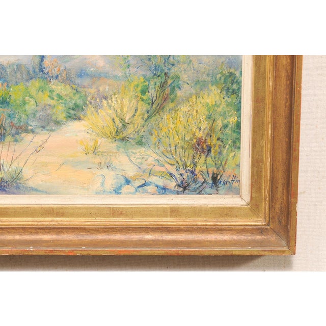 An American mountain-scape framed painting from the mid 20th century. This mid-century impressionistic California...