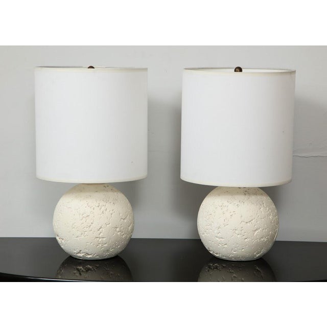 Pair of Bespoke textured circular plaster lamps.
