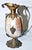 19c France embodied in this mother-of-pearl shell and brass ewer style perfume bottle, sometimes aka: viniagrette, with...