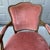 A lovely vintage French Provincial style arm chair with mauve pink velvet upholstery and nail head trim. The chair frame...