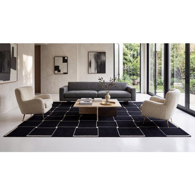 Elevate your interior with striking modern sophistication. Masterfully hand-crafted, this luxury wool area rug features a...