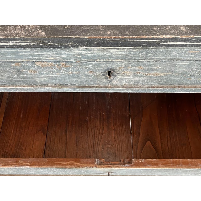 Neoclassical chest of drawers hand-crafted in Italy in the early 1800s using walnut and painted in a beautiful blue-jeans...