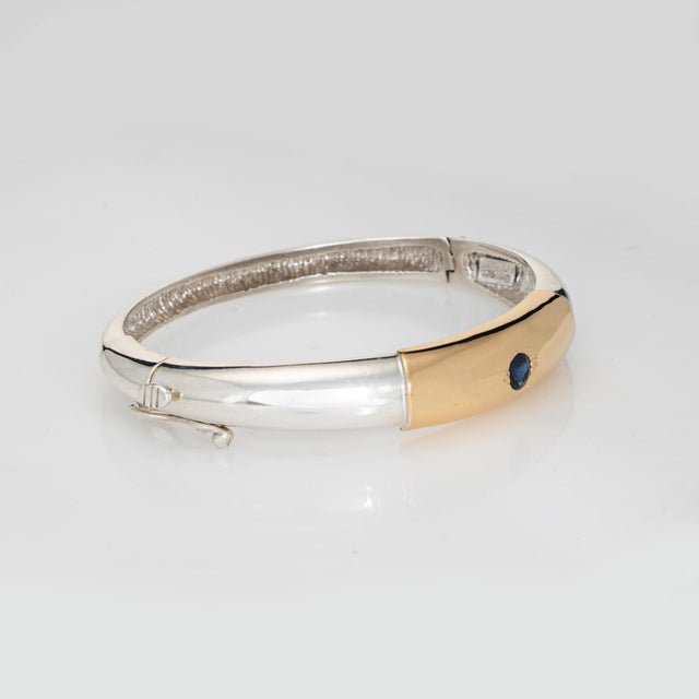 Stylish & finely detailed vintage Ilias Lalaounis bangle bracelet, crafted in sterling silver & 18 karat yellow gold...