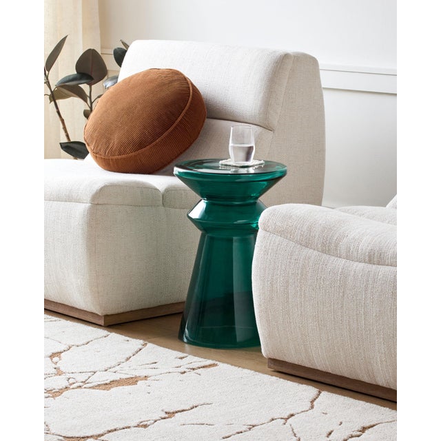 Introducing the Donora End Table, a sleek and stylish addition to any home. With its Minimalist Modern design, this piece...