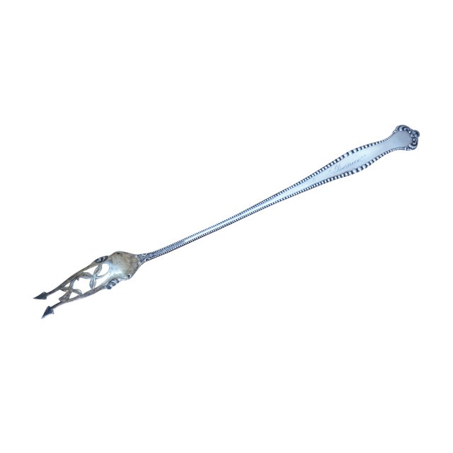 Antique 20th century 925/1000 sterling silver pickle fork by Towle Silversmiths in the Canterbury pattern. Beaded edge...