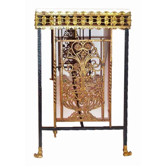 C. 1920's Oscar Bach style antique iron and bronze console table having intricate filigree metalwork border and panels...