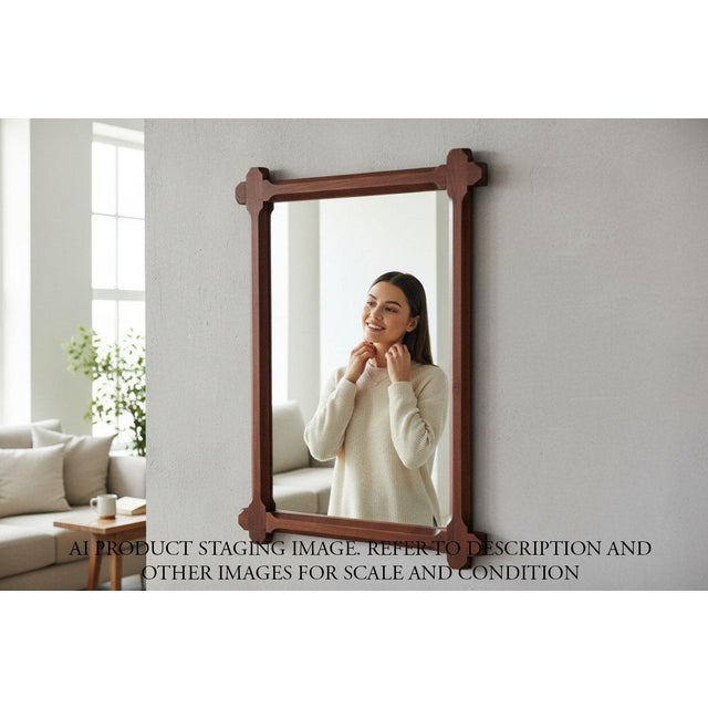 Make a striking statement with this large vintage solid mahogany overmantel mirror, expertly crafted in the late 20th...