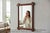 Make a striking statement with this large vintage solid mahogany overmantel mirror, expertly crafted in the late 20th...
