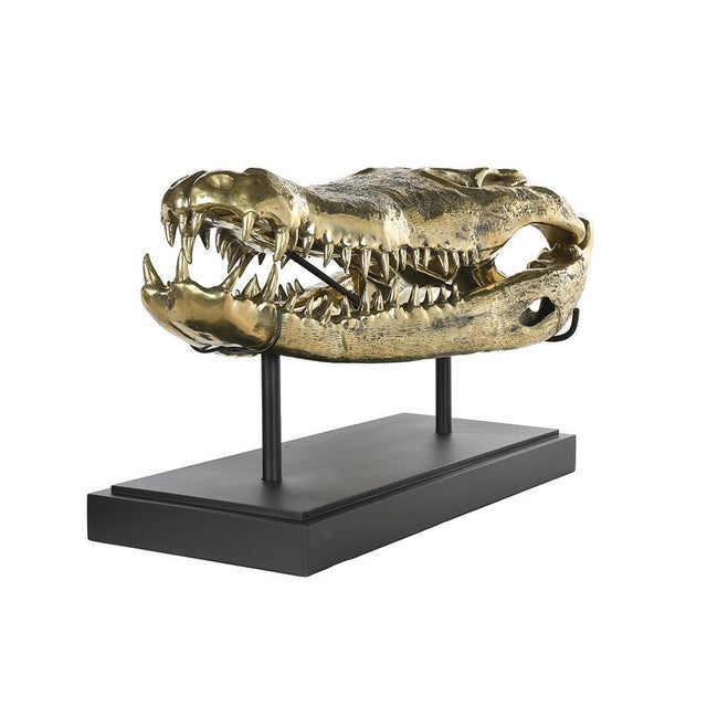 Beautiful brass crocodile skull. This piece is designed in the style of the selected designer and/or manufacturer