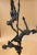 Bronze abstract sculpture of acrobats by American artist Gerald Fellman. The sculpture depicts a trio of nude acrobats...