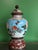 A highly impressive and unusually large Japanese cloisonné enamel lidded vase, standing 18 inches tall and constructed in...
