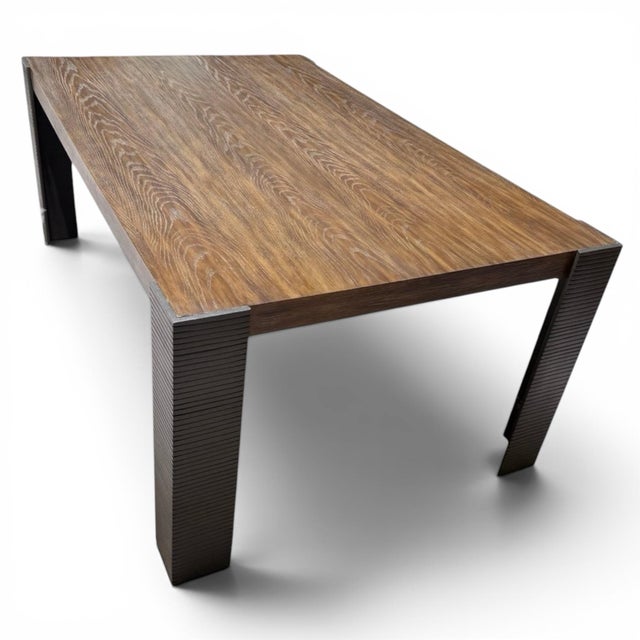 Stunning table from luxury furniture icon Gregorius Pineo. The Battista Table is handmade, featuring a substantial oak...