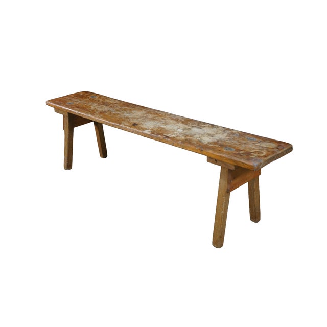 This rustic and authentic vintage utility bench features an elongated rectangular seat crafted from a solid, heavy oak...