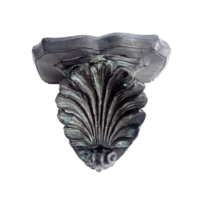 Charming vintage Rococo-style shell wall bracket crafted from heavy plaster, featuring a distressed black finish with jade...