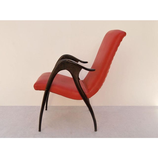 Malatesta and Mason armchair, 1950s, Made in Italy. Ebonized wood armchair with original patina of the period. The fabric...