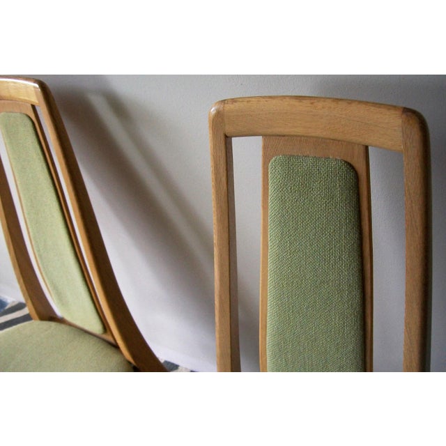 Vintage pair of 'Eva' dining or side chairs designed by Niels Koefoed, Denmark, in oak. Very good condition with minimal...