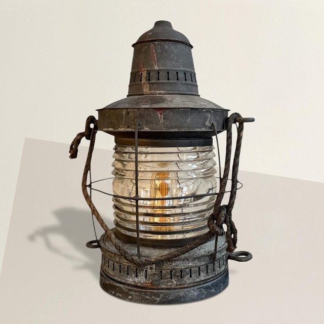 Function first. Beauty followed. This late 19th century American ship’s oil lantern was built for visibility in...