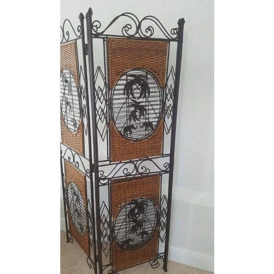 Vintage Oriental Style 3 panel room divider features a wrought iron frame with woven rattan panels palm tree silhouettes...