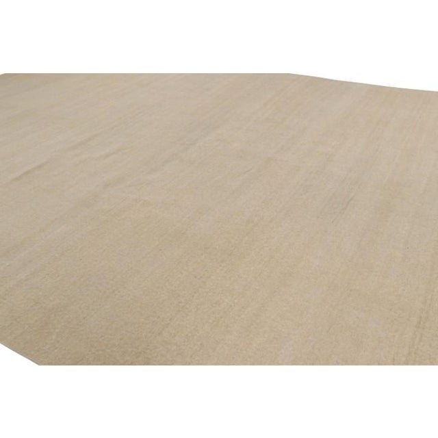 Hand-knotted in wool, this 11x17 contemporary rug is the newest addition to the Rug & Kilim Textural Collection, with an...