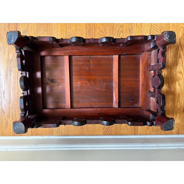 A striking mid-century Chinese Ming-style low accent table or bench, beautifully crafted from solid Asian rosewood...