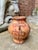 This handmade terracotta vessel appears to be a vintage or antique earthenware pot, possibly of Mexican, Central American,...
