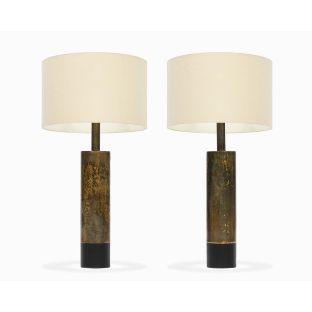 Here is a fantastic pair of patinated Brutalist metal table lamps by Laurel Lamp Co., circa 1960s. The large cylindrical...