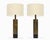 Here is a fantastic pair of patinated Brutalist metal table lamps by Laurel Lamp Co., circa 1960s. The large cylindrical...