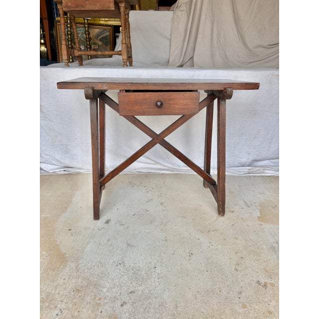 Found in Italy, this Late 19th Century Italian Fratino Style Console Table was crafted from walnut in the late 1800's....