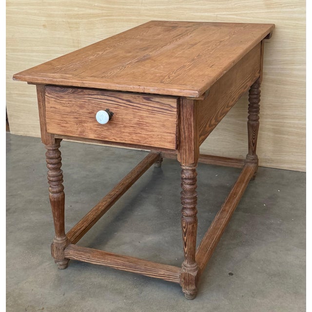 Pine refectory table. The whole piece has a beautiful patina and attractive proportions. Tables like these most likely...