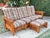 Solidly-made 1990s Arts and Crafts sofa with ottoman. Quarter sawn oak wood has beautiful lines and grain. Sturdy and...