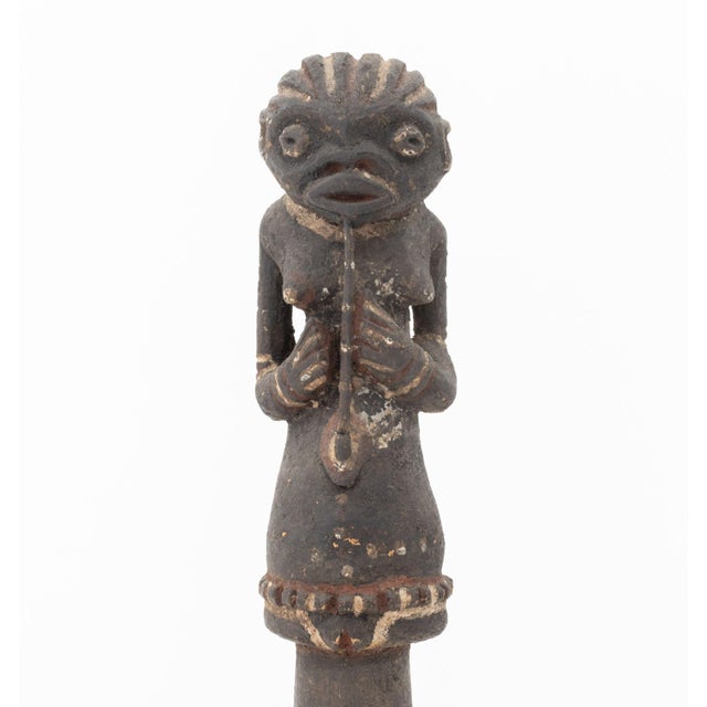 Mambila Tawong Trumpet, Cameroon, early 20th century, polychrome painted and hand-carved wood, the mouthpiece in the form...
