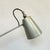 Painted metal conical shade on a steel articulated arm with parallel rod construction and counterweight mechanism. Chrome-...