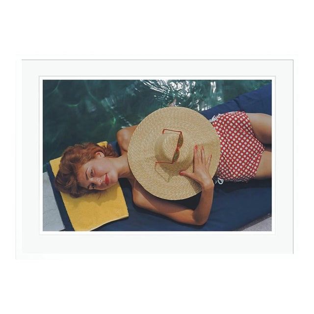 Sunbathing in Burgenstock 1955 by Slim Aarons White Framed C-Print Photograph For Sale