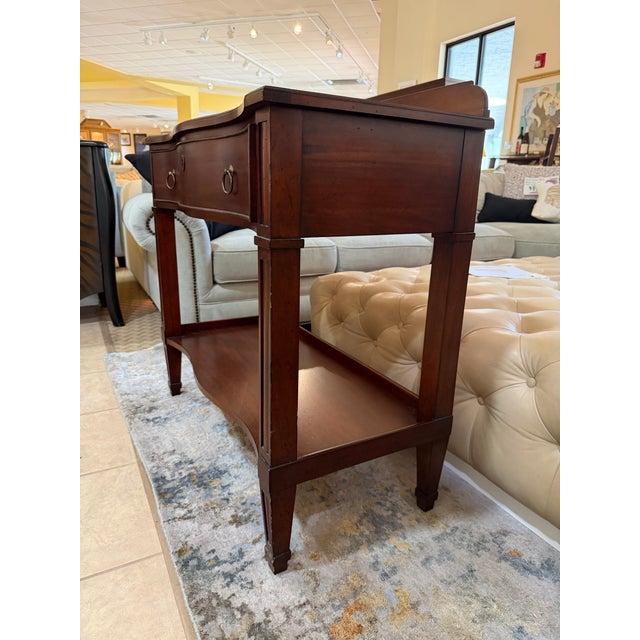 Add classic American luxury to your home with this exceptional vintage Federal-style tiered console table from the...