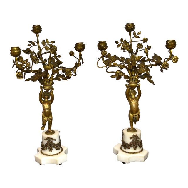 French 19Th Century Louis XVI Style Gilt and Bronze Mounted Cherub Candelabras on White Marble Stands For Sale