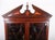Fine george iii style mahogany corner display cabinet dating to circa 1820 the upper section with a broken swan-neck...