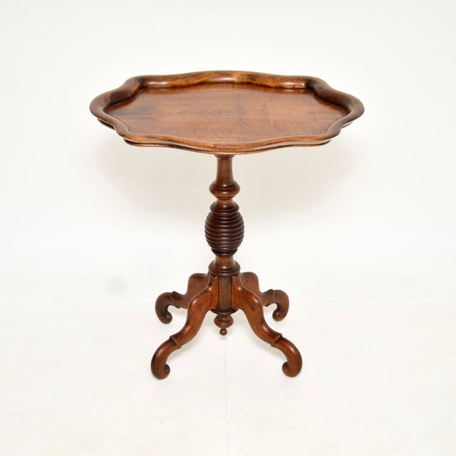 A beautifully made antique Victorian walnut occasional side table. This was made in England, it dates from around the...
