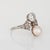 Finely detailed antique Edwardian diamond & pearl 'moi et toi' ring crafted in 900 platinum (circa 1910s). Center set old...
