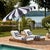 Transform your outdoor space with the Meze 9 ft crank umbrella in a chic navy stripe design paired with a sleek white...