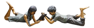 Lifesize Reading Boy and Girl Statues in Bronze, Set of 2