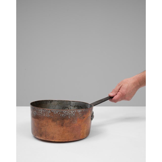 This 19th Century French copper pot showcases the rich patina and handcrafted character that define traditional French...