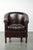 We are offering this dark cowhide leather club armchair, which is in good condition and features a timeless and stylish...