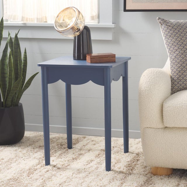 Enhance your home with the Paislynn Accent Table in a tranquil blue color. This elegant table features a versatile design...