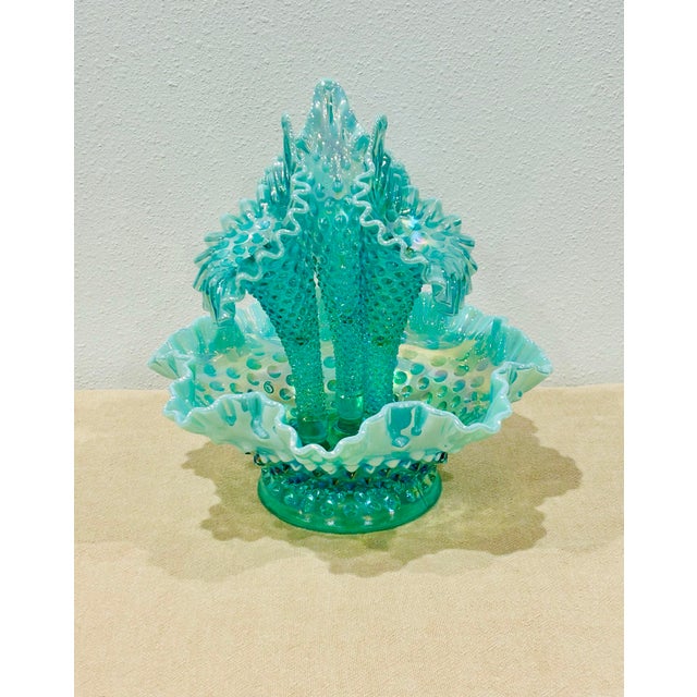 Stunning Fenton mid-century opalescent sea green hobnail centerpiece with three calla lilly shaped glass horns. This piece...