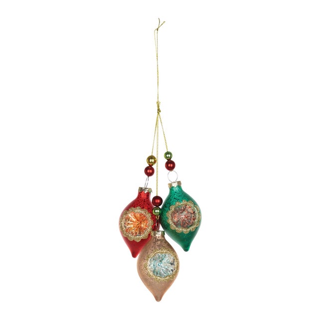 Bring a touch of timeless holiday charm to your Christmas tree with this exquisite set of Glass Reflector Drop Ornaments....