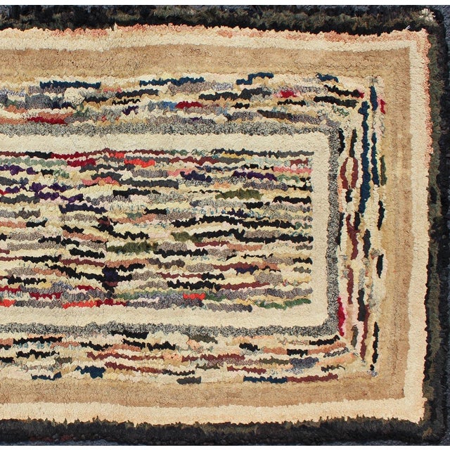 Measures: 2'4 x 5'2 American Hooked Rug with Variegated Design in Black, Brown and Taupe Antique hooked rug with...