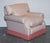 A wonderfully comfortable traditional English country house armchair with matching footstool, designed for relaxed living...