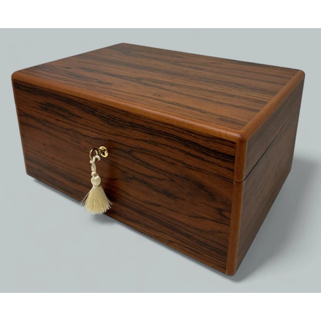 This well figured Mahogany jewellery casket was manufactured by the famed manning of Ireland company and is truly a jewel...