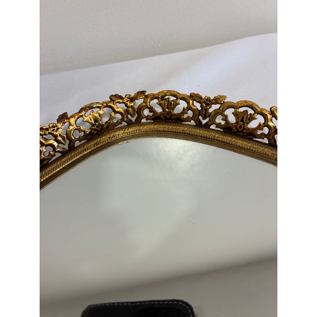Chairish Description A glamorous vintage Matson vanity tray with a mirrored center and a delicate pierced filigree gallery...